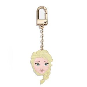 BaubleBar Gold and Pink Character Face Keychain